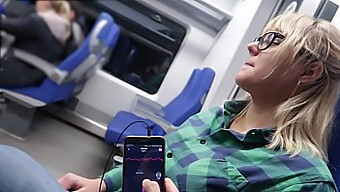 Experience the thrill of remote-controlled orgasm on a train