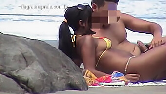 Young Couple Engages In Public Sex On A Beach