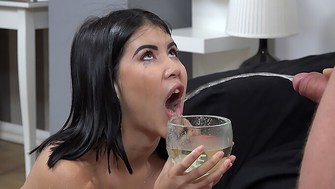 Submissive girl swallows urine from piss play