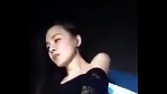 A Chinese Girl Performs A Sensual Dance In A Nightclub