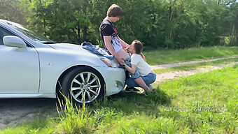 A Young College Student Engages In Outdoor Sex With A Car As A Backdrop