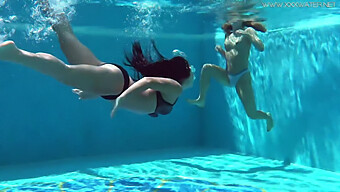 Two Barefoot Women Splash And Play In A Pool