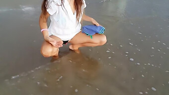 Petite Girl Shows Off Her Tight Upskirt And Butt Plug While On Webcam At The Beach